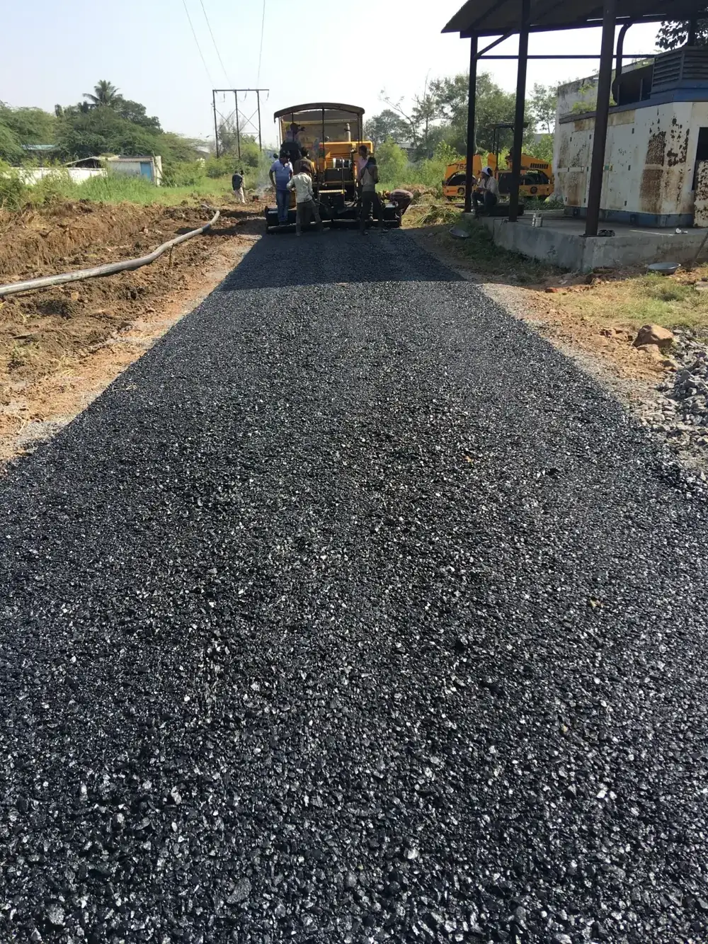 Heavy-duty interlocking paver block road construction by CIP